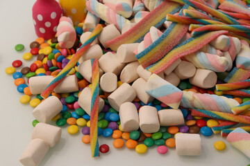 Different sweets decorating a beautiful party table.
