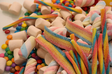 Different sweets decorating a beautiful party table.