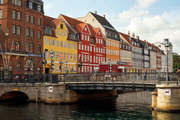 Fototapeta na wymiar Denmark. Copenhagen. Colorful embankment Nyhavn. Bright houses and ships. September 19, 2018