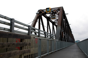 Old Metal Railroad Bridge Converted for City Bus Transport
