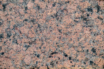 Granite slab texture background. Brown, gray and black colors