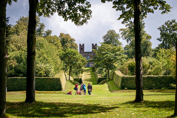 Landscaped vista with Belvedere Tower, at the end of it, Claremont Landscape Garden, Esher, Surrey, UK