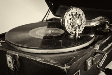 Phonograph with crank. Old gramophone Isolated on a white background. - 369562539
