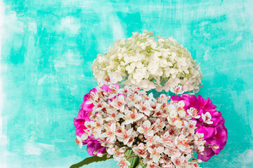 eautiful flowers background with hydrangea and pelargonium, free space for your design	
