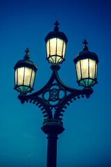 Street lamp at night, London, UK