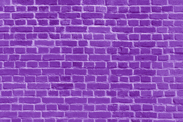 Fototapeta na wymiar The background of the old violet brick wall for design interior