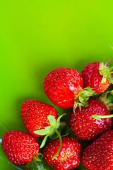 Fresh ripe juicy strawberries on the orange plate