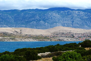 Fototapeta na wymiar Beautiful landscape on the Croatian coast, the island of Pag and the mountain Velebit
