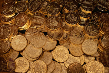 Bullion gold coins. Large pile of Austrian Philharmoniker pure gold coins.  Conservative investor's...