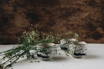 Tea cups with herb
