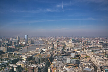 An aerial view of London, UK along the River Thames.