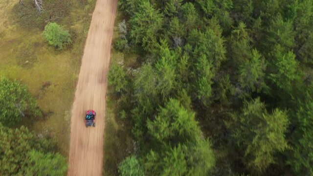 ATV driving through the woods in Northern Michigan