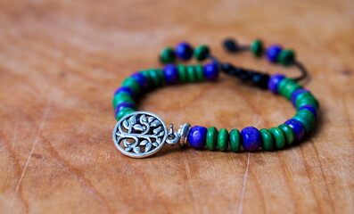 Bead bracelet on the wooden table