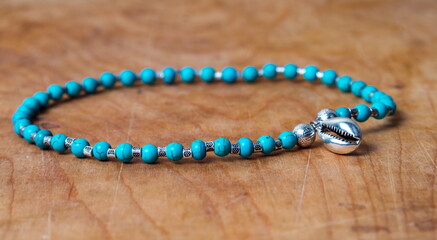 Bead bracelet on the wooden table