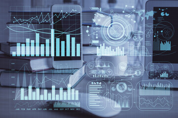 Double exposure of financial graph drawing and cell phone background. Concept of forex trading