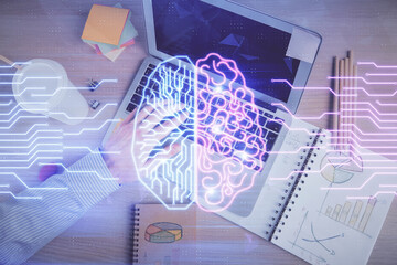 Double exposure of man's hands typing over computer keyboard and brain hologram drawing. Top view. Ai and data technology concept.