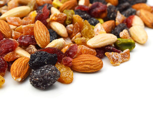 Mix nuts, dry fruits and grapes on a white background