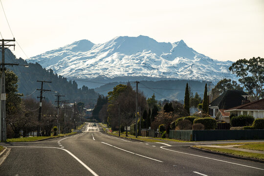 Goldfinch Street in Ohakune, New Zealand, with Mt Ruapehu and Turoa ski field in the background.