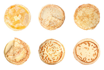 Set of tasty thin pancakes on white background, top view