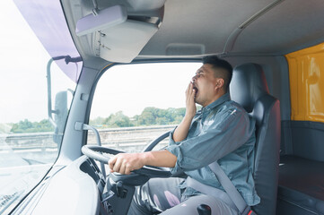 Professional adult truck driver is tired, transport, and deliver for a long time.