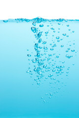 Various bubbles, sharp and blurry. Floating from the middle of the water up to the water surface Blue background