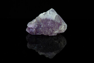 violet fluorite with cubic pattern on black background
