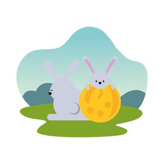 cute rabbits easter season characters with egg painted in camp