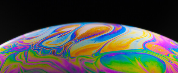 abstract colourful background with patterns and rainbow effects in soap  bubbles.