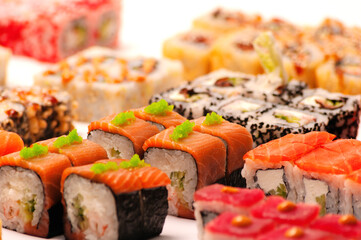 Layout of Japanese rolls with elements of a blurred background.