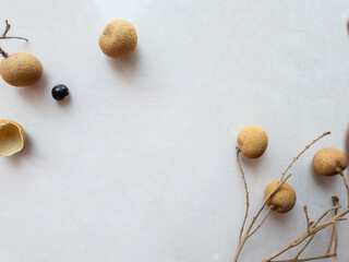 Composition of longan fruit for typography background and text design. Fresh fruit arrangement for wallpaper
