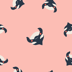 Cute flat killer whale seamless pattern. Adorable little cartoon orca vector illustration. Childish ornament for textile, fabric, print, wallpaper, wrap paper