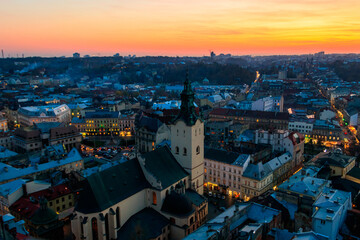 Aerial view of Latin cathedral and Rynok square in Lviv, Ukraine at sunset. View from Lviv town hall