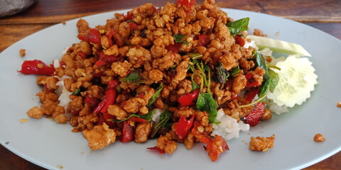 Dishes prepared from meat and vegetables, Thai herbs. (Stir-fried pork basil) tastes spicy, delicious, beneficial to the body.