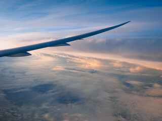 Fototapeta na wymiar View of dawn from airplane