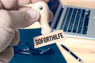 Ein Stempel mit dem Aufdruck Soforthilfe