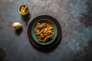 Eggplant dish served on the plate on the table