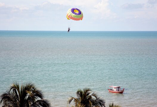 parasailing on a beach in penang