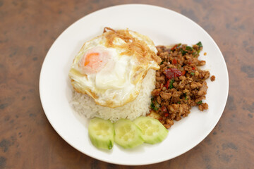 Pad Kra Pao or stir fried chicken with holy basil as traditional Thai food