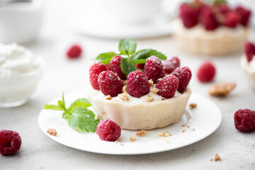 dessert with mascopone cheese, fresh raspberries and nuts