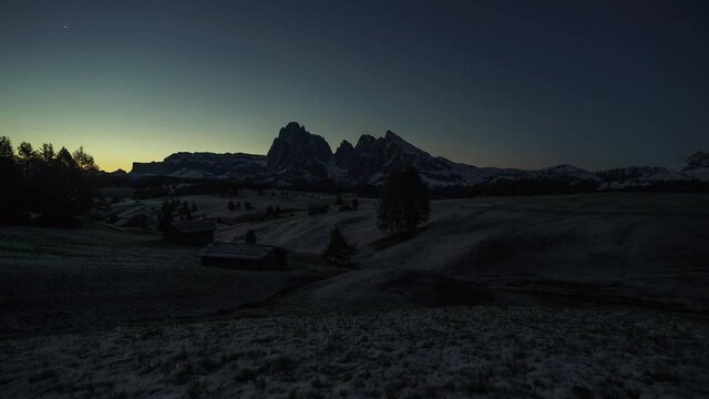 Sunrise at Dolomits in Italy with beautiful mountains with little Snow and green Gras