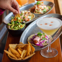 Mexican tacos, drinks and dip spread