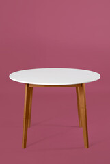 Dining table on color background