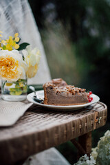 chocolate cake and flowers in the garden, cottagecore style