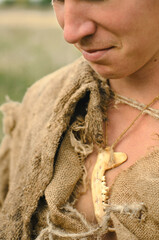 fragment of medieval clothing made of sacking