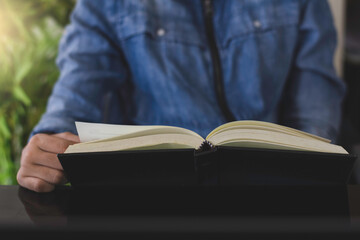 .Student read book at outdoor.