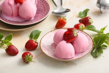 Plate with tasty strawberry ice cream on white background