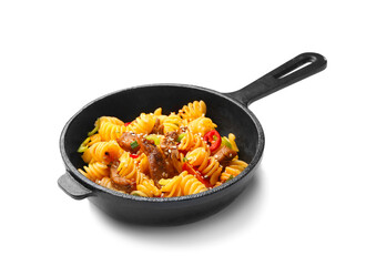 Frying pan with tasty pasta and chicken on white background