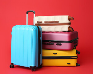 Packed suitcases on color background. Travel concept