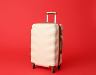 Packed suitcase on color background. Travel concept