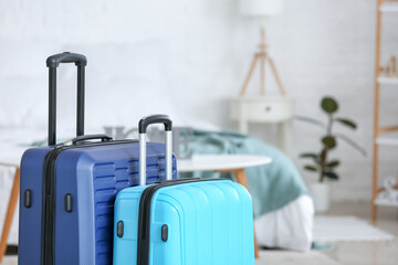 Packed suitcases at home. Travel concept